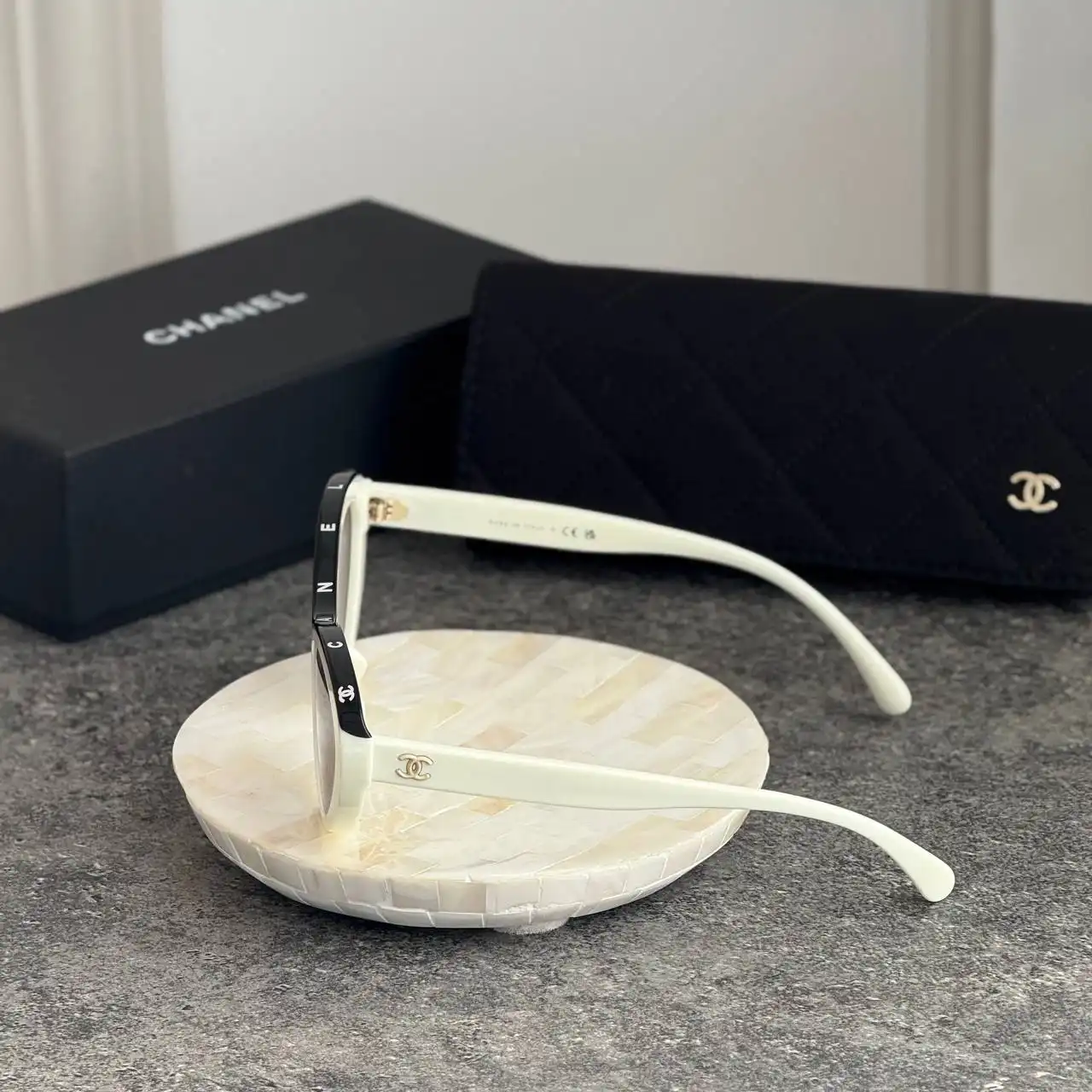 CHANEL Chanel Oval Sunglasses In White-Black Acetate Frame With Gray Polarized Gradient Lenses